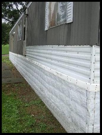 Steel mobile home skirting after 20 years of exposure to the elements and contact by rocks, debris, and weed control devises.